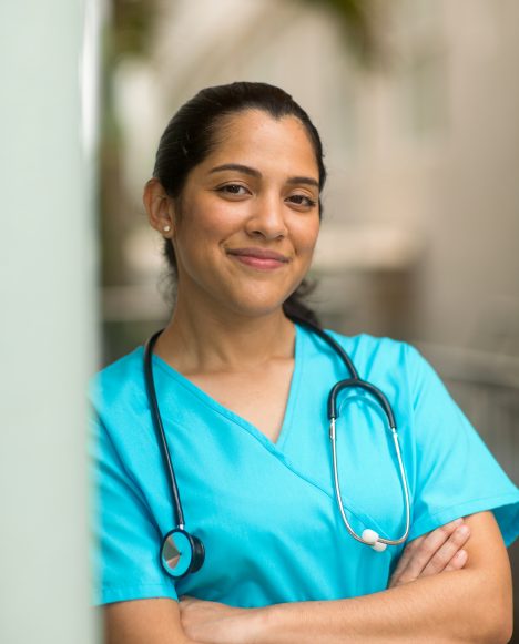 Hispanic female nurse smiling